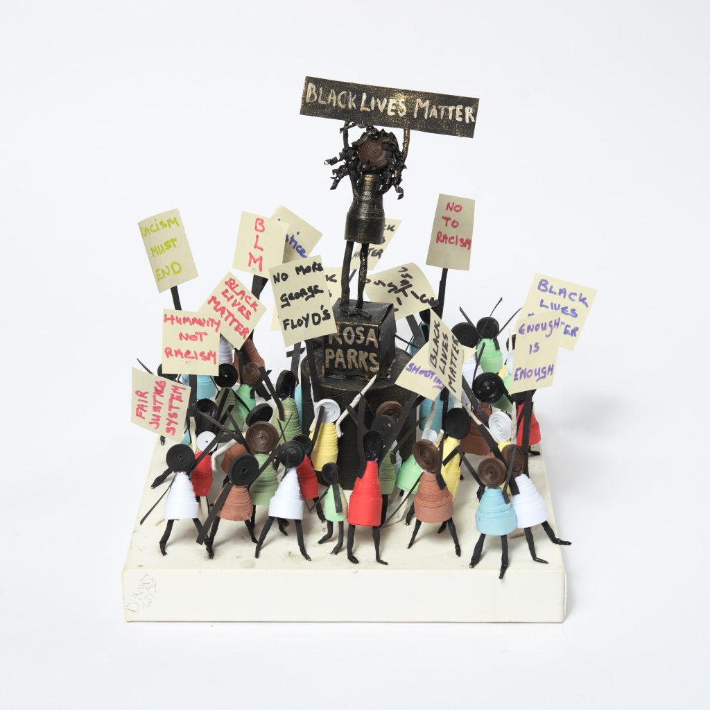A sculpture of a Black Lives Matter protest